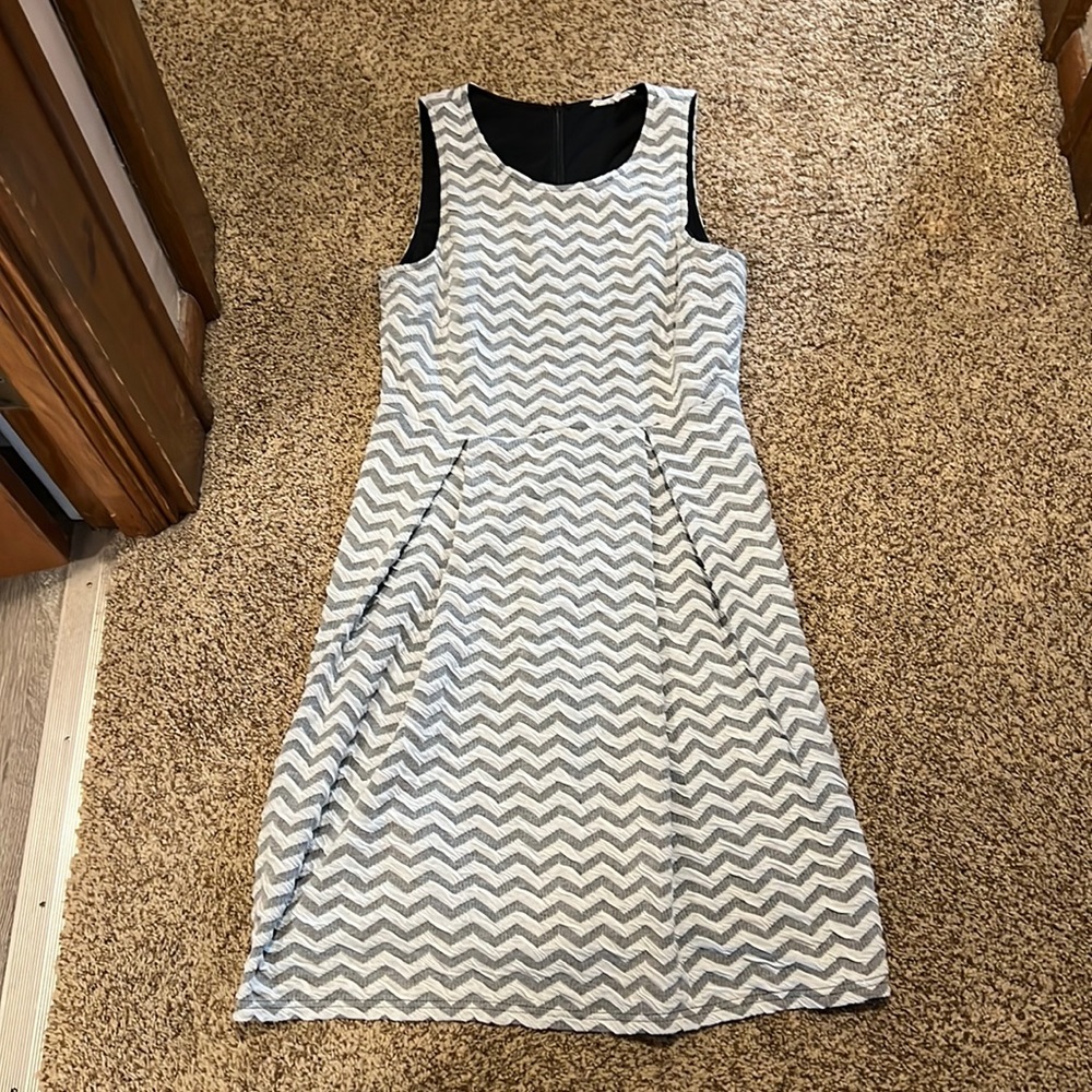 Women’s gray and white dress.